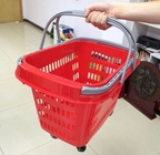 Rotes Rollen-Plastikeinkaufslaufkatzen-Korb/tragbarer Speicherkorb mit Rädern